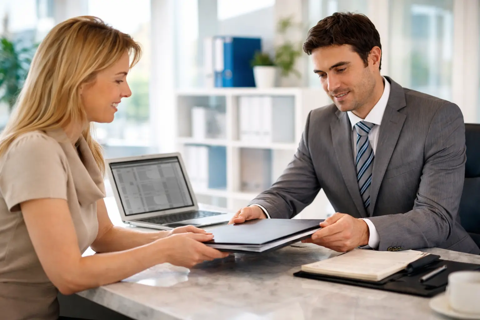 Smiling businesswoman handing her LLC Operating Agreement folder to a bank manager across a desk.